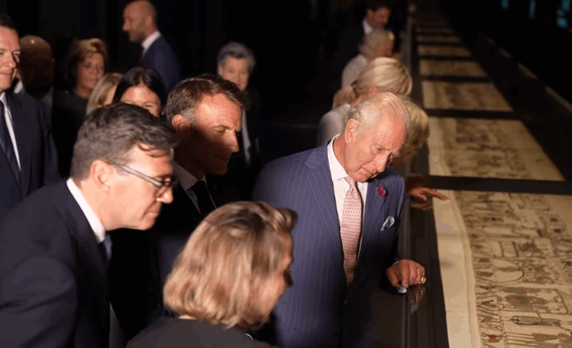 King Charles views the Bayeux Tapestry