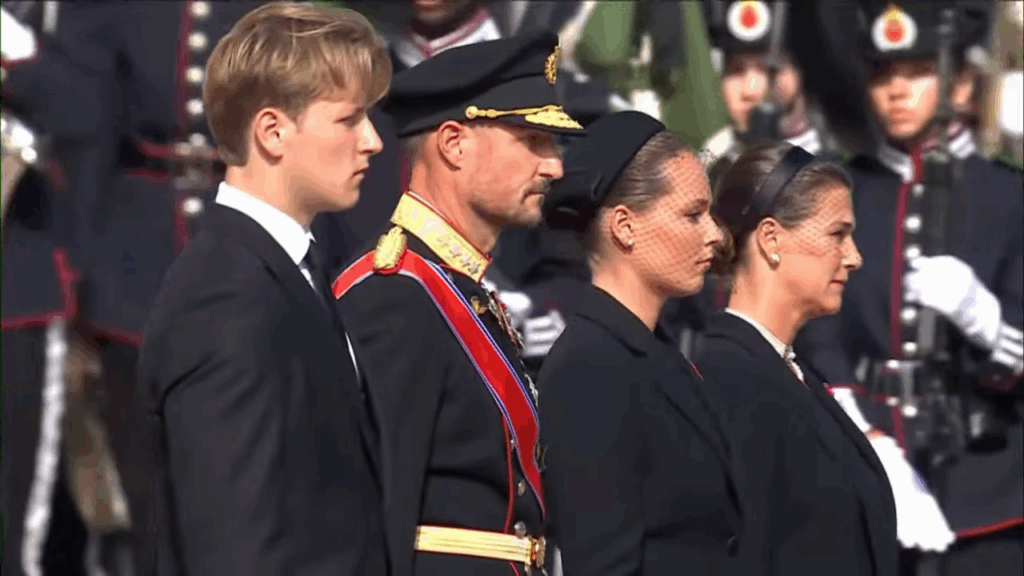 King Haakon, Crown Princess Ingrid Alexandra, Prince Sverre Magnus and Princess Martha Louise follow King Harald's funeral bier