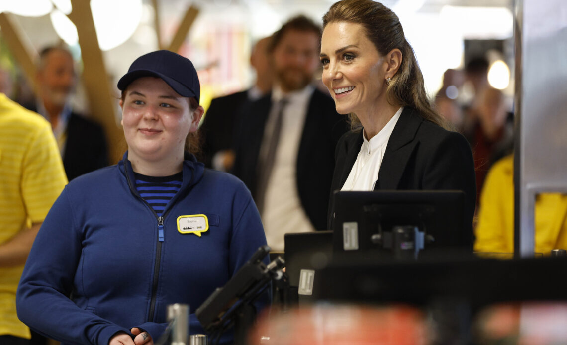 The Princess of Wales works on a till at IKEA