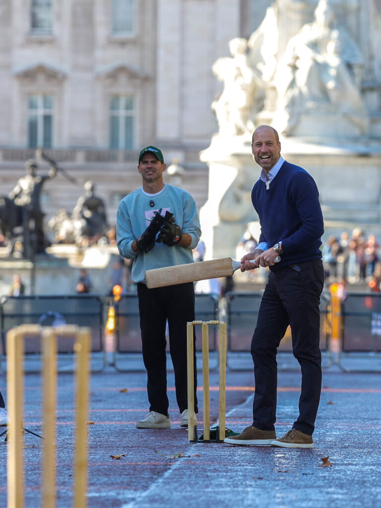 The Prince of Wales plays cricket at Buckingham Palace